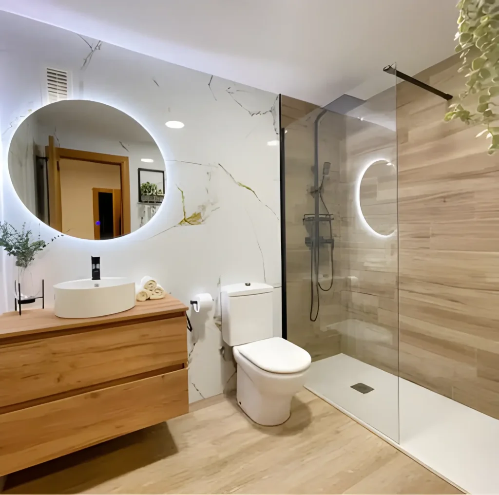Baño reformado en Leganés con mampara y grifería nueva